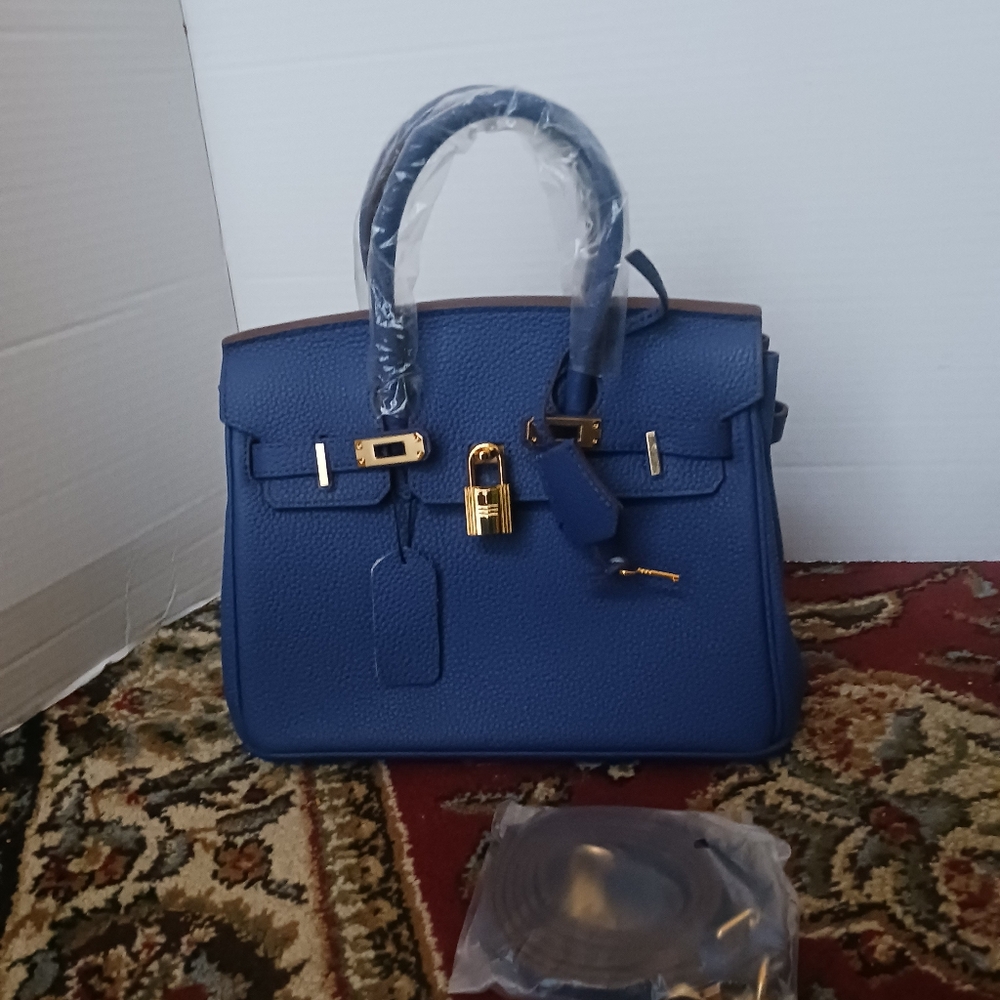 Elegant Blue Handbag with Gold Accents